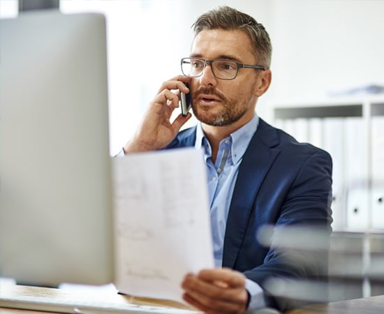 Business owner looking over the results of the One Step Dark Web scan.